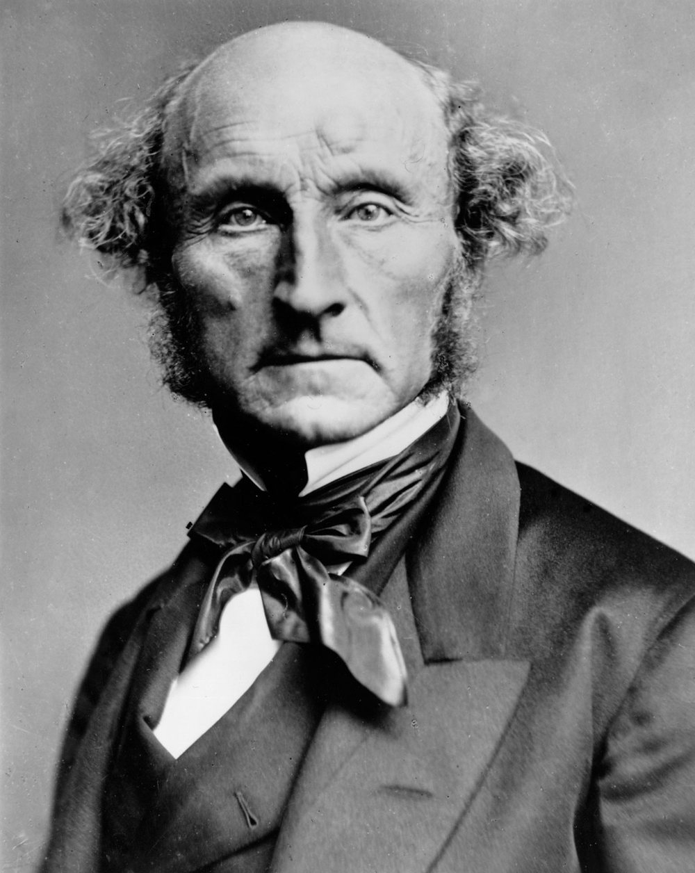 John Stuart Mill hacia 1870, fotografiado por la London Stereoscopic Company.